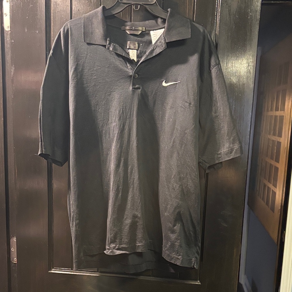 Nike Men’s Black Polo with White Swoosh